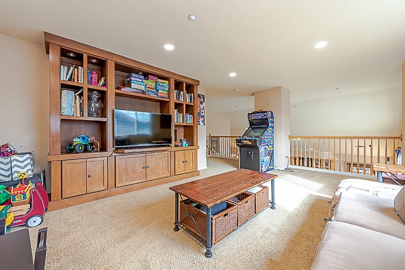 Private Living/television room upstairs where guest bedrooms are located. 