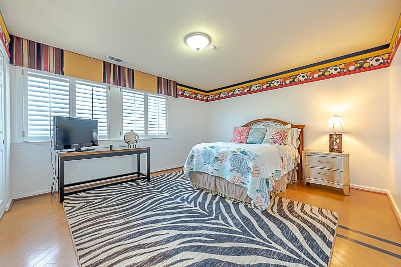 Guest Bedroom B ~ Large room, designer closet with drawers, wooden shutters and mini-fridge. 