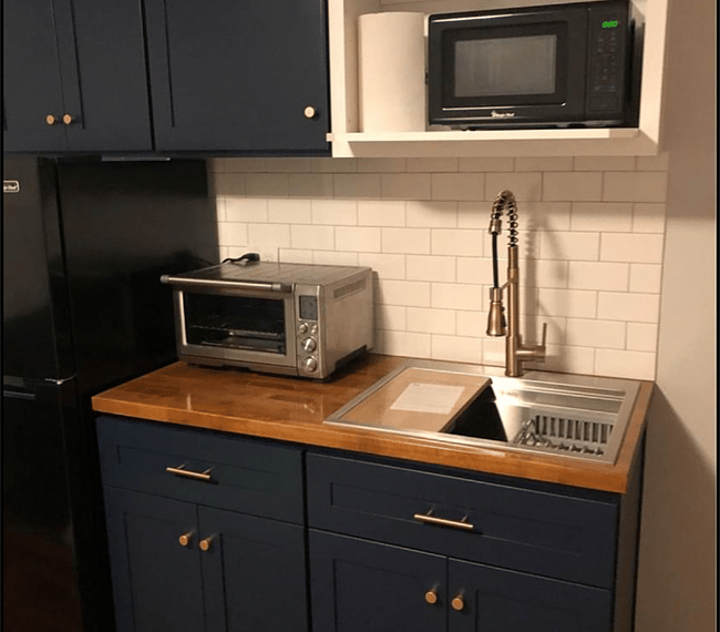 Convection oven/toaster oven combo, microwave and full size fridge.