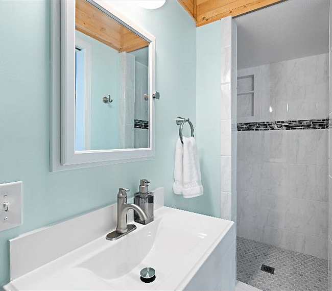 Tiled shower and bathroom floor