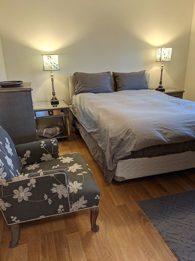 Bedroom #1 with queen bed and half bath