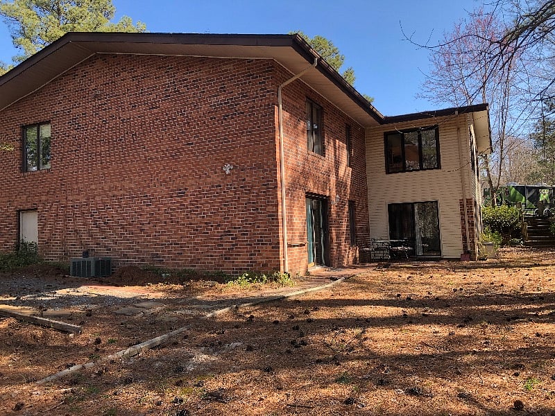 Your parking space next to the ground floor apartment walkway. There is a glass-topped table with four chairs to enjoy outdoor eating in warm weather!