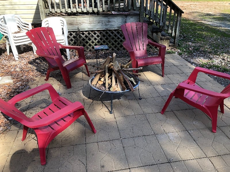 Fire pit with four chairs can be enjoyed by our tenants.
