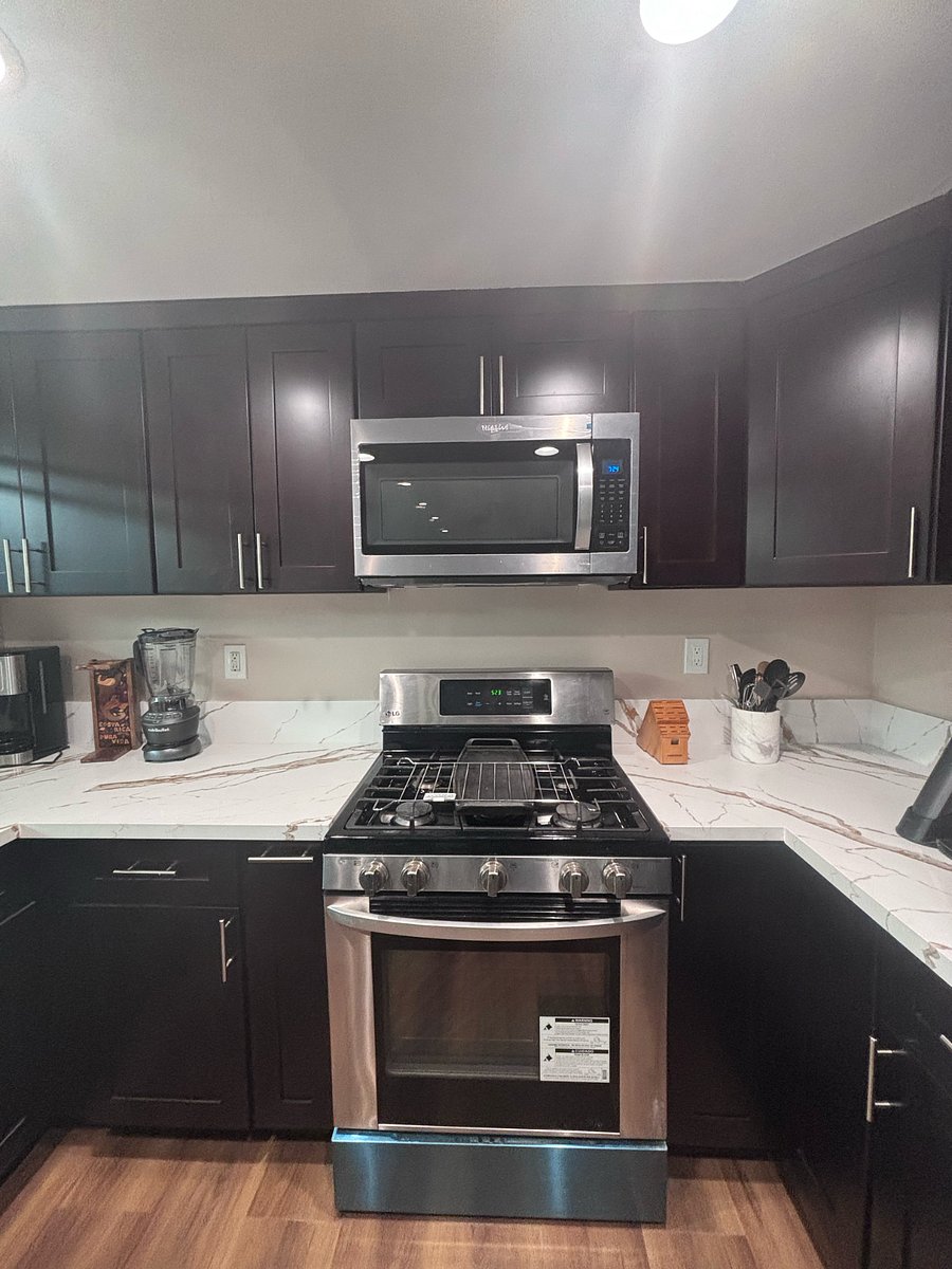 Brand new quartz countertops, cabinets and kitchen appliances