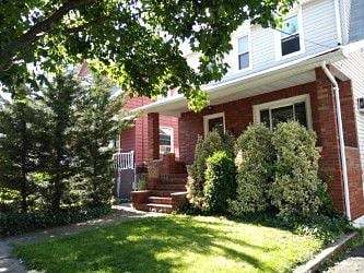 Front of the house with our large bushes that we planted 12 years ago.