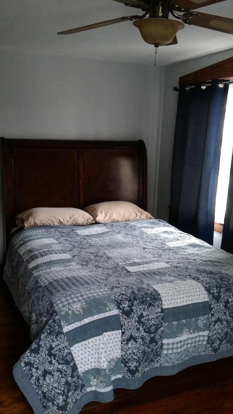 Master bedroom with queen size bed, ceiling fan and air conditioning. This will be occupied December 1.