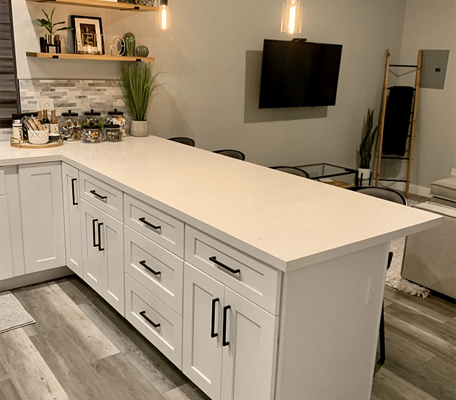 Large kitchen peninsula to eat at or set up a work station.