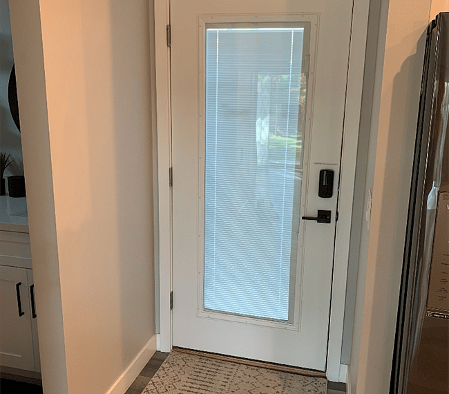 Front door with adjustable screen.