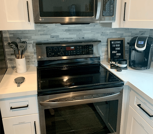 Full sized, new LG microwave and oven.