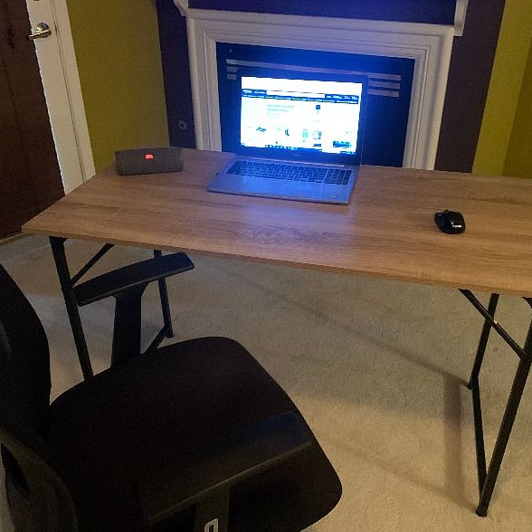 Working desk and ergonomic chair. Comfortable, watching TV or eating also.