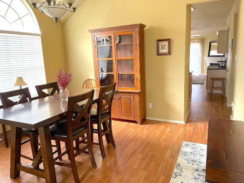 Enter into the 2nd living area which is a great space for working, dining and playing. 