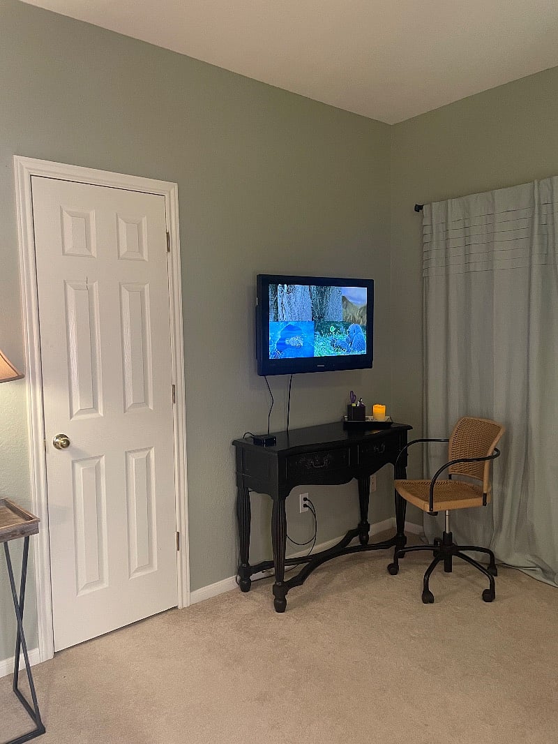 Apple TV inside your room. Can also be used as a monitor for any of those compliance modules you'll have to complete for your assignment.