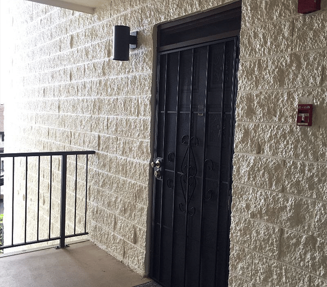 Front door  with security screen. 