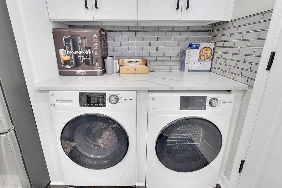 Seamless Utility: In-home eco-friendly washer/dryer, Smart TVs, and all utilities included for a seamless transition to the District.