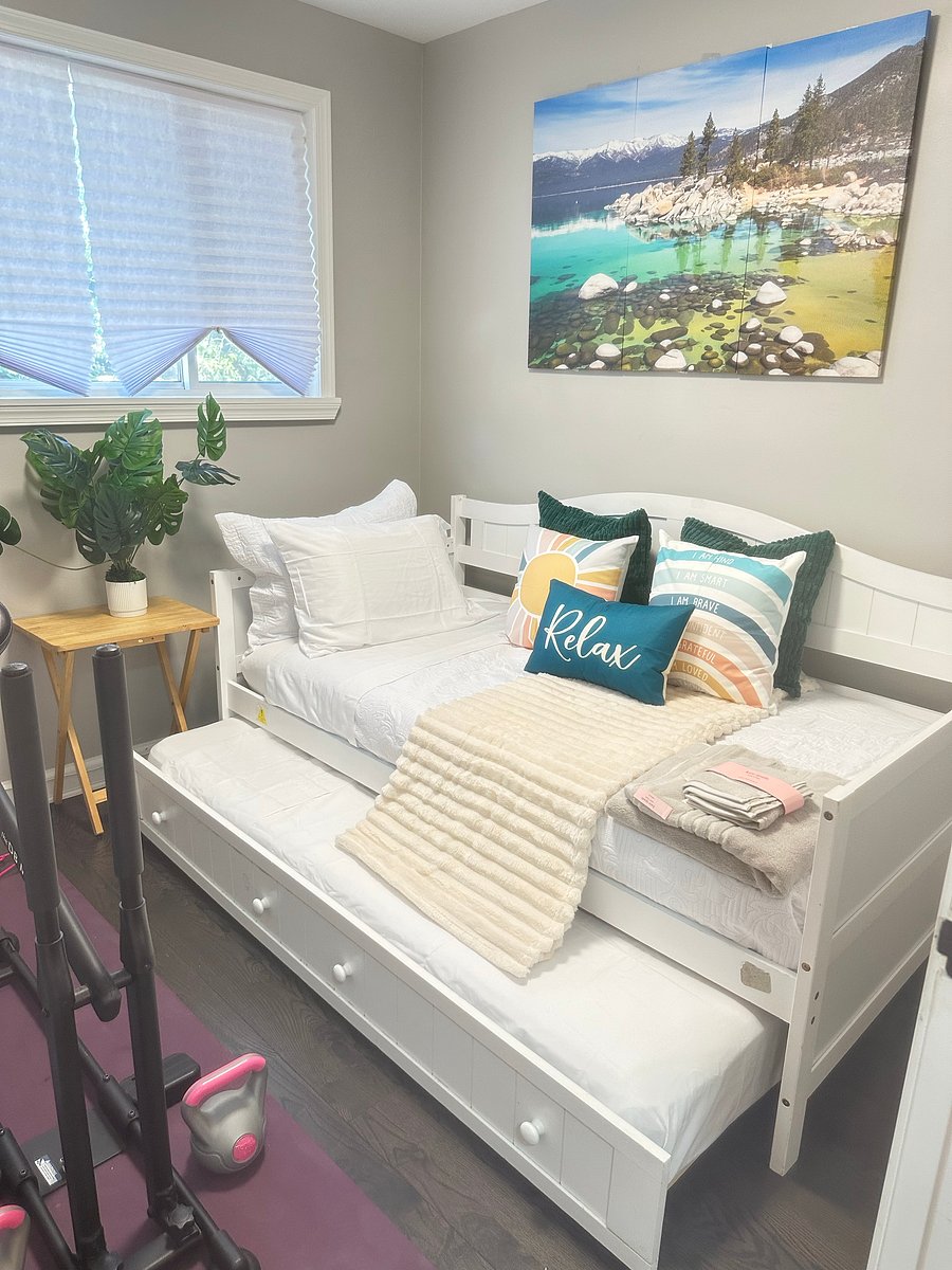 The Flex Room: Beautiful Lake Tahoe inspired sleeps 2! Includes a twin daybed with pull out trundle bed for guest - easily closes to create more room for you to enjoy wellness. Room features pilates reformer/mat, DB method squat machine & free weights.