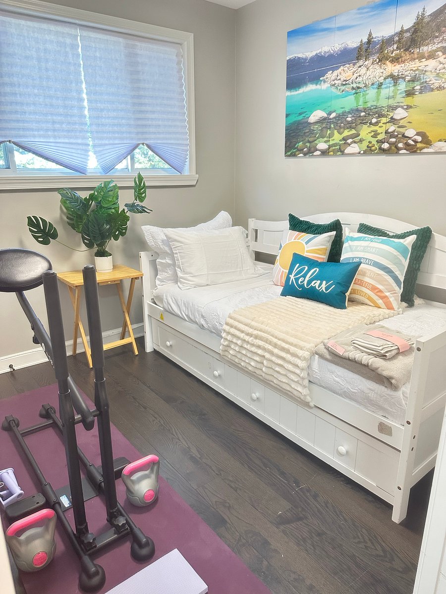 The Flex Room: Beautiful Lake Tahoe inspired sleeps 2! Includes a twin daybed with pull out trundle bed for guest - easily closes to create more room for you to enjoy wellness. Room features pilates reformer/mat, DB method squat machine & free weights.