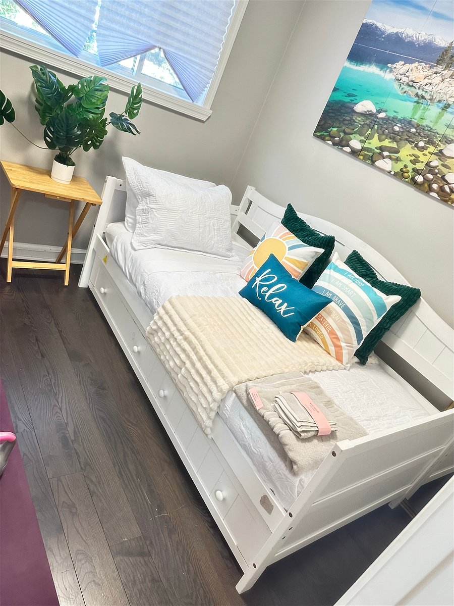 The Flex Room: Beautiful Lake Tahoe inspired sleeps 2! Includes a twin daybed with pull out trundle bed for guest - easily closes to create more room for you to enjoy wellness. Room features pilates reformer/mat, DB method squat machine & free weights.