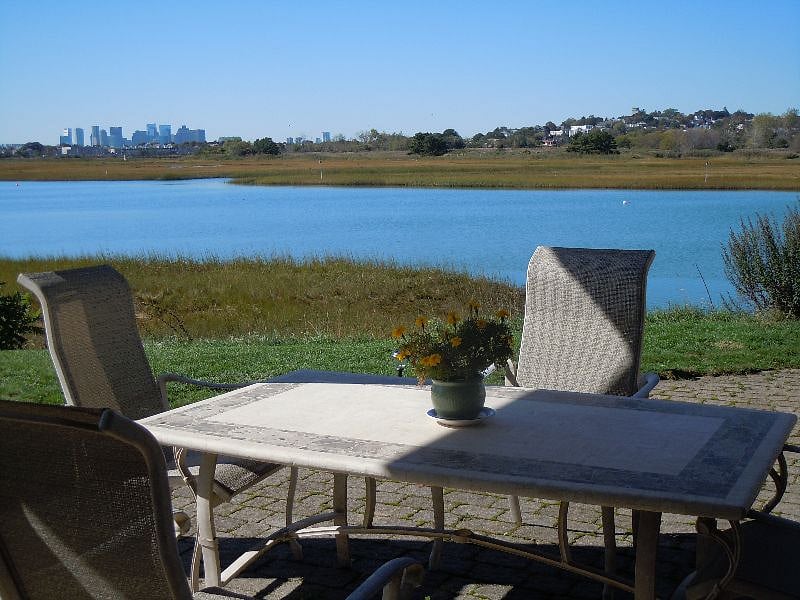 marsh and Boston skyline view from patio table