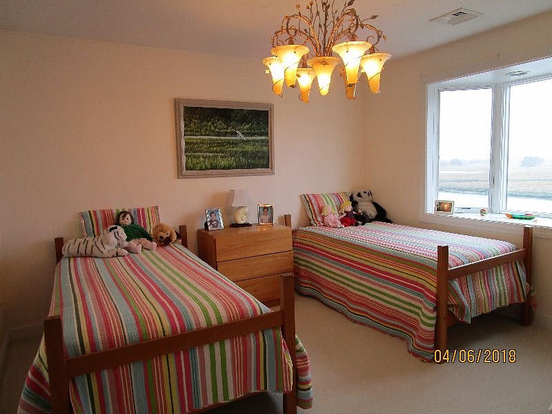 bedroom 3 - two twin beds, view to west over inlet and marsh 