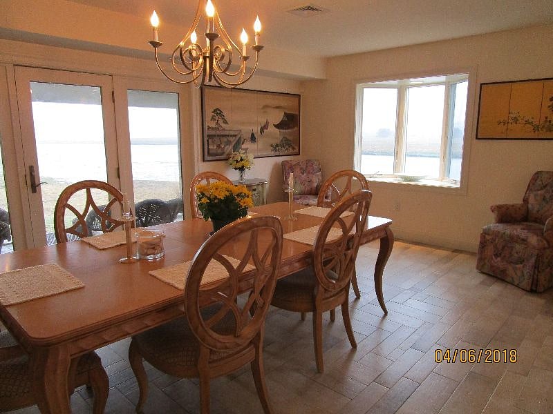 dining table seats eight, view over inlet and marsh 