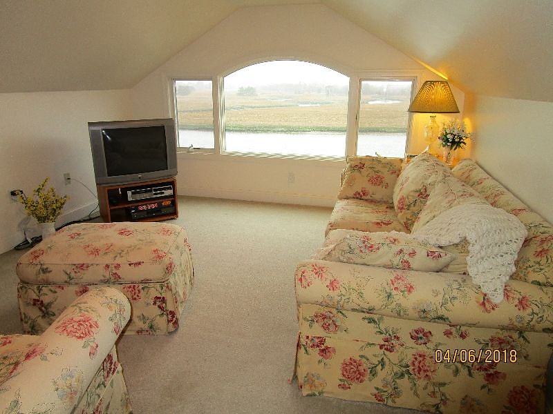 third floor family room with view west over inlet and marsh 