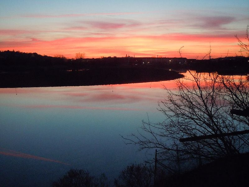 sunset seen from our home looking west over inlet and marsh 