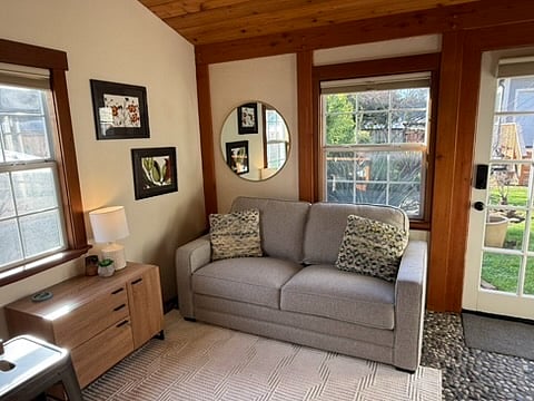The sofa pulls out to make a full-size bed.