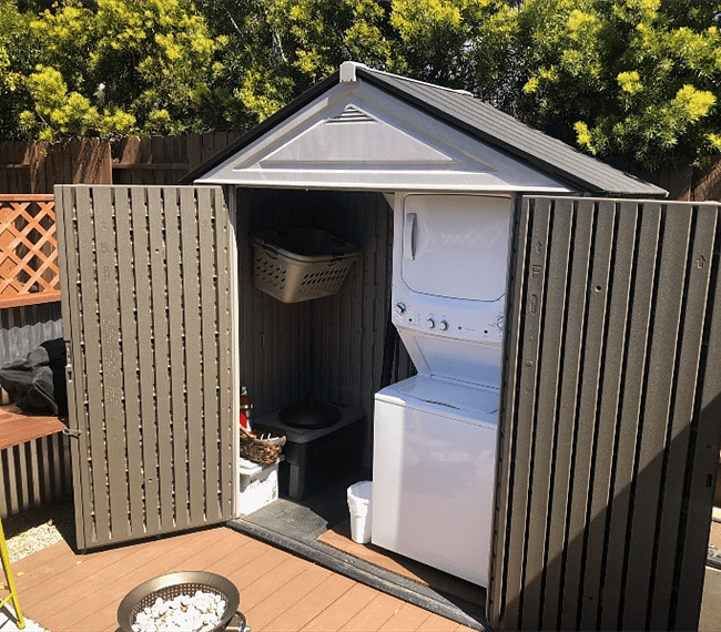 Private shed with storage space and personal washer/dryer unit