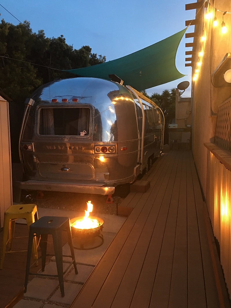 The propane fire pit and patio lighting make this a very comfy patio