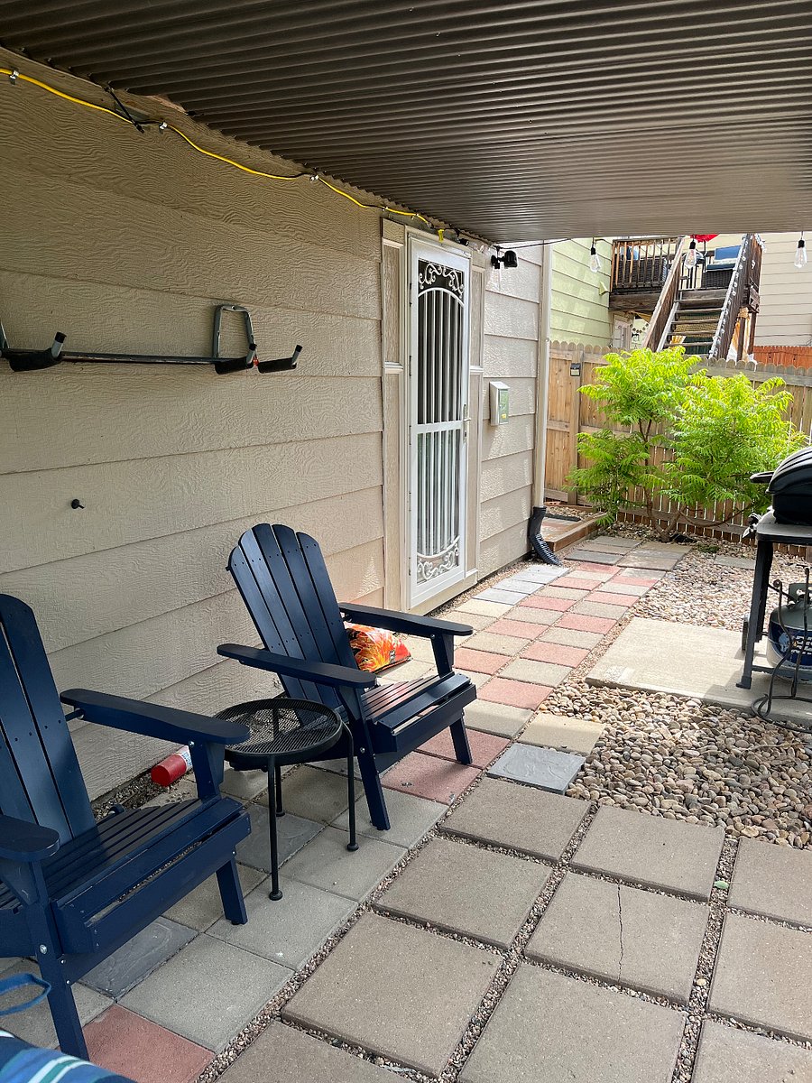 Grill and patio chairs are just outside your door.