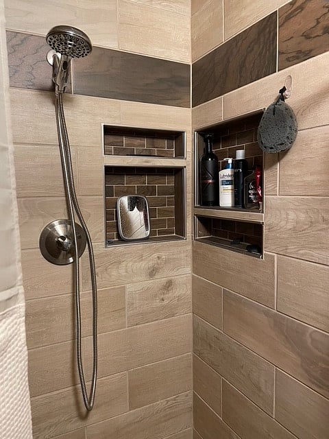 Bathroom is "wet room" style.