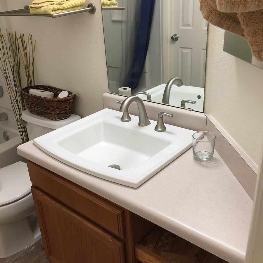 Attached bathroom with tub/shower combination