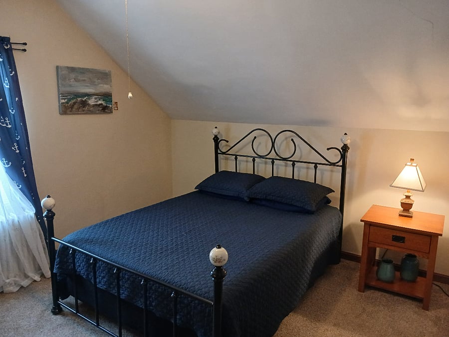 Bedroom 2. Queen bed.