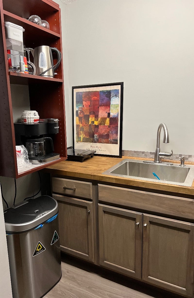Appliances described above. The limited counter space can be supplemented by using the desk surface to the right of the red frig. 