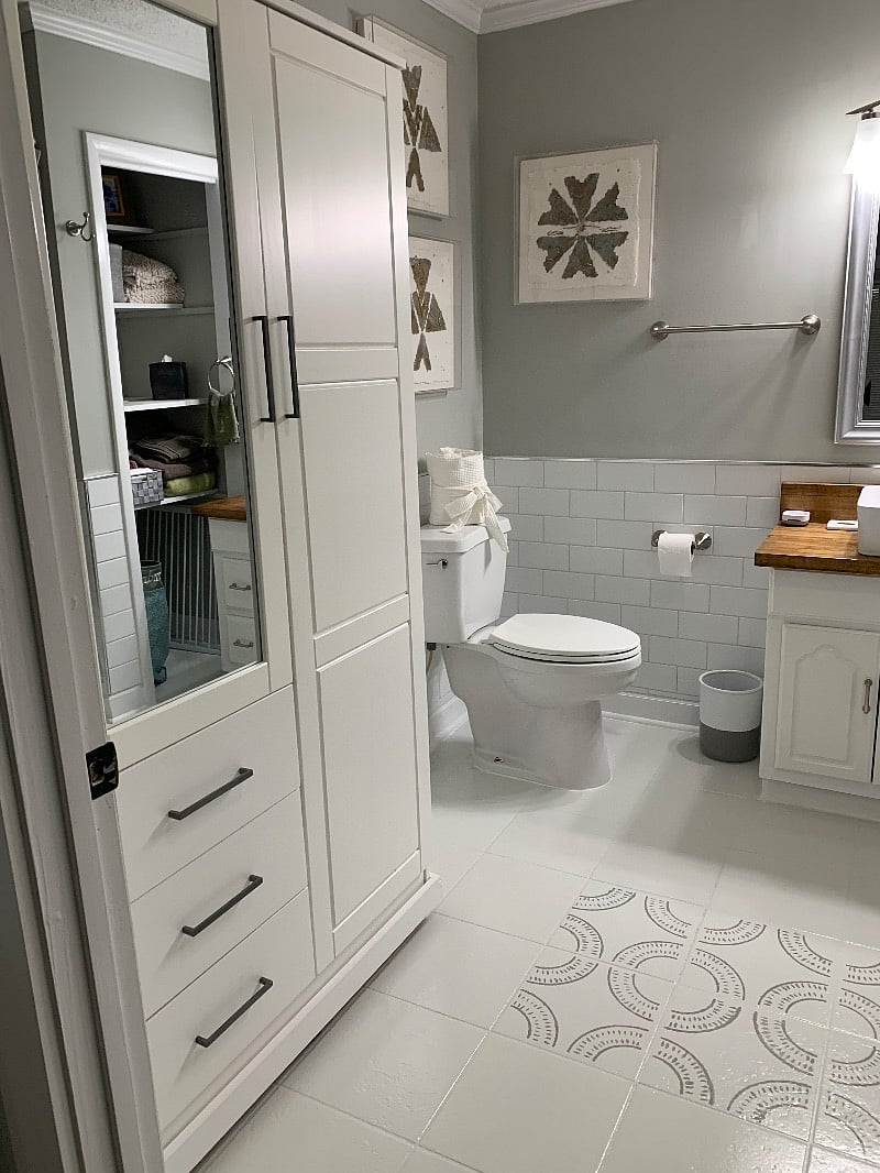 The wardrobe provides 2 hanging roads, 3 deep drawers and 3 deep shelves for clothing storage along with a 5 drawer chest of drawers and a six cube organizer with choice of open cubes or fabric bins. 
There is also a 6ft tall x 4 ft wide 2 tier rolling clothes cart available for use if needed. 