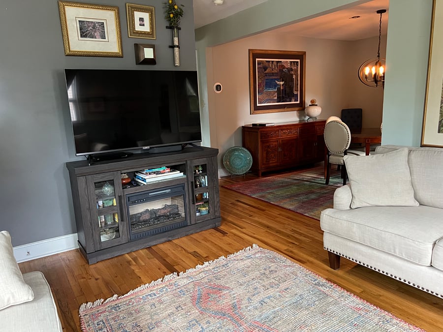 Smart TCL 55 inch TV with fireplace in the TV stand. Fireplace offers heat, light or both.
