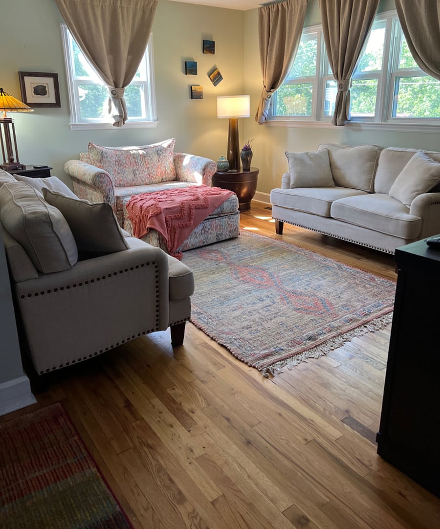 Living area is furnished with 2 generously proportioned love seats and a 1.5 chair that converts into a twin bed. There is an oversized ottoman that serves as a coffee table as well as a footrest.