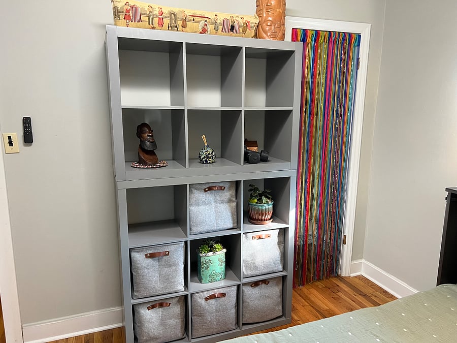 Storage cubes left open or with an arrangement of fabric bins provides easy access for clothes and personal effects while the closet to there right provides hanging space along with shelving for personal items. Remote control personalizes use of multi-setting ceiling light and fan.