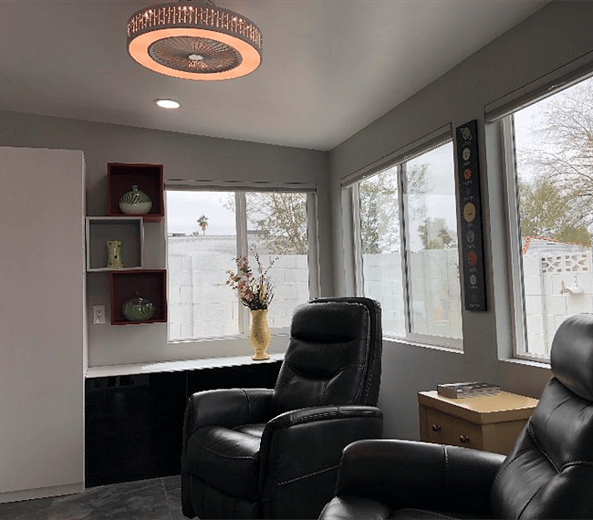 Sun room to enjoy the average of 299 days of sun. Two electronic recliners with TV.