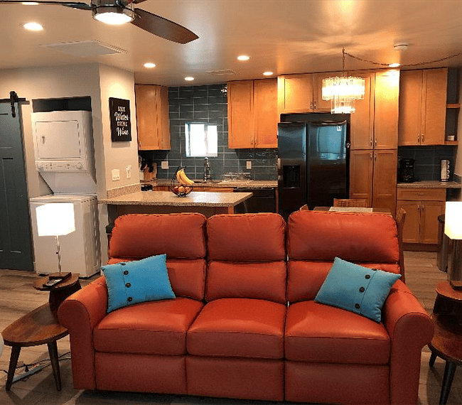 Open concept living room and kitchen. Full size stackable washer and dryer.