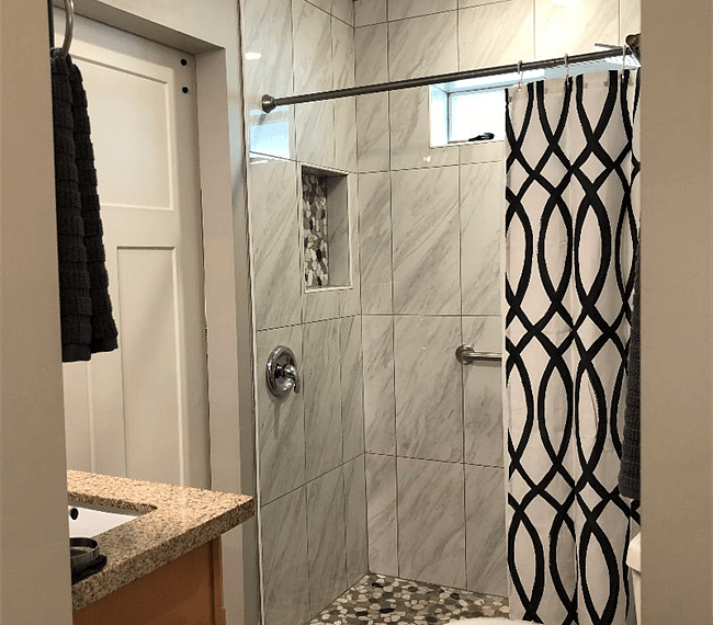 Bathroom with two doors so that the master can use directly or have closed for guest or second bedroom use. Walk-in shower.