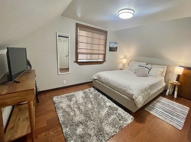 Queen bed in upstairs bedroom