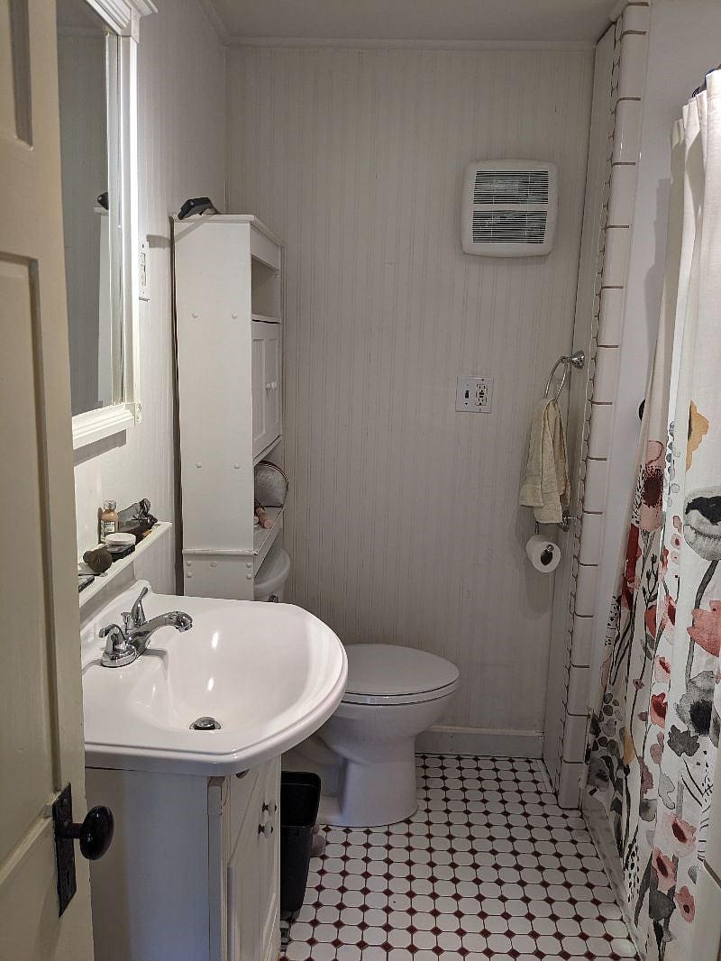 Bathroom with shower on right