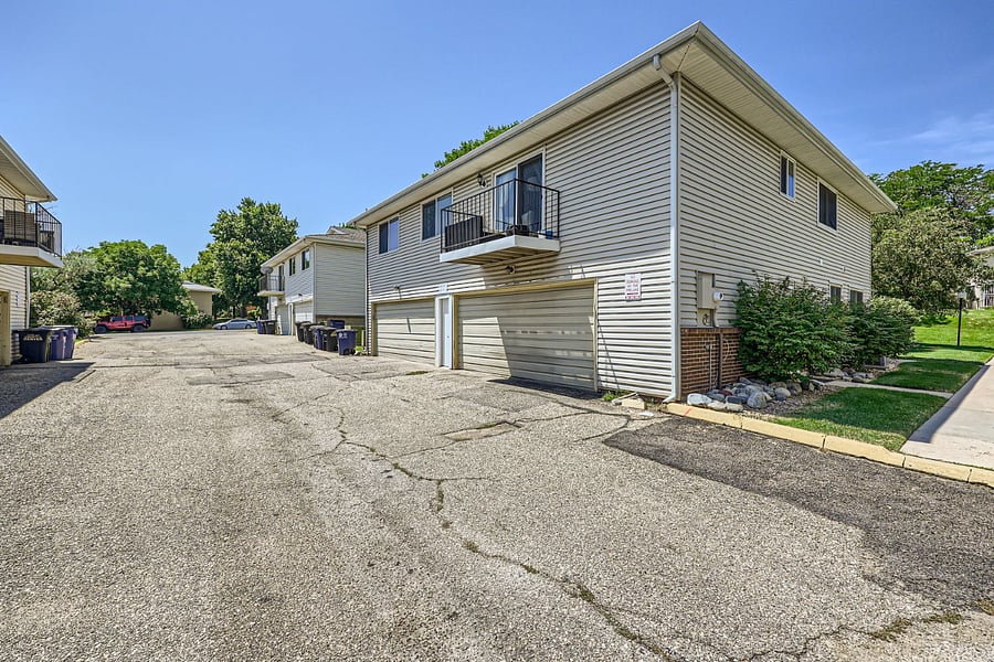 Garage on far right under unit and balcony off of living room.