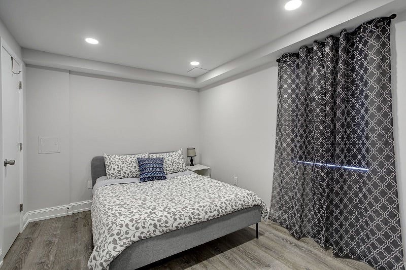 Bedroom with blackout blinds.