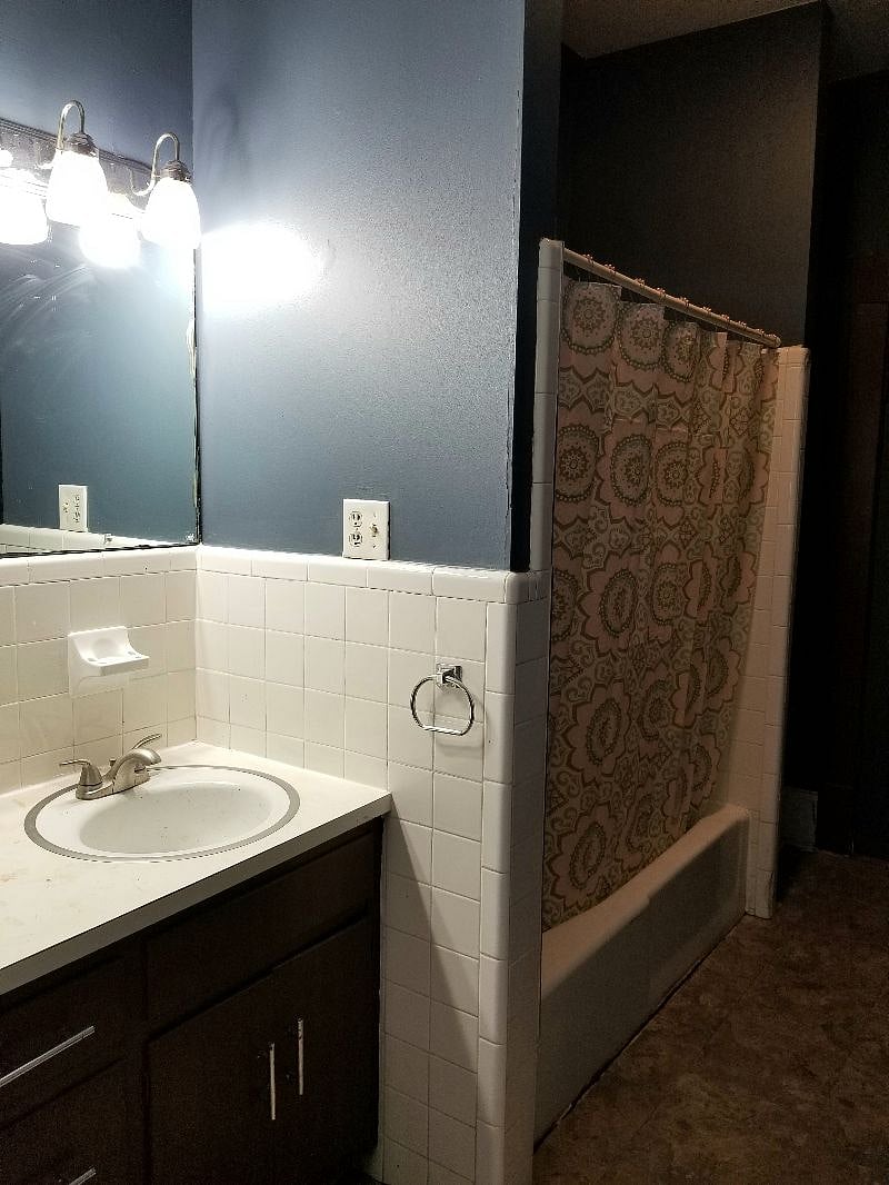 Bathroom with shower and bath