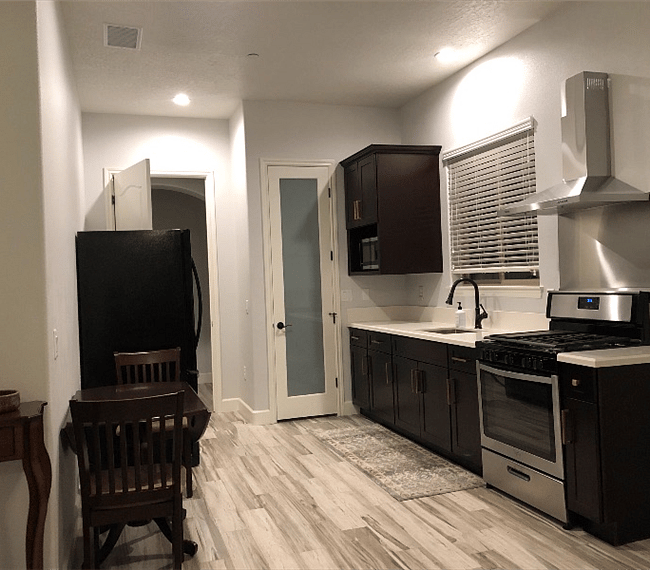 Pantry and full size refrigerator.  