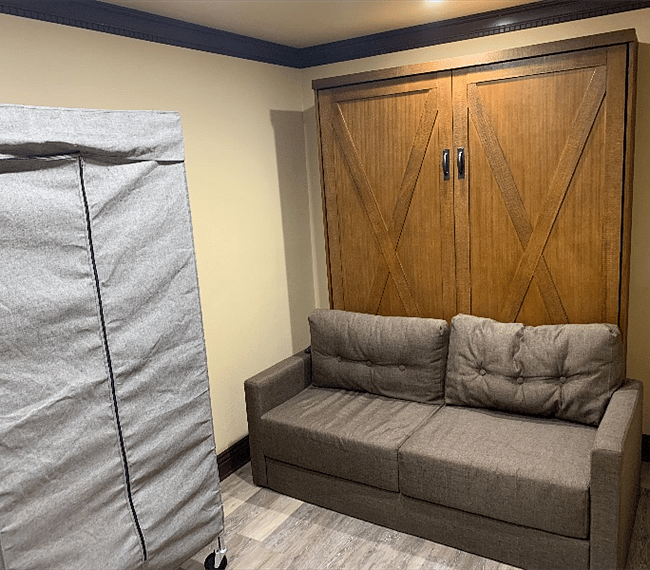 This is a Murphy bed. Queen.