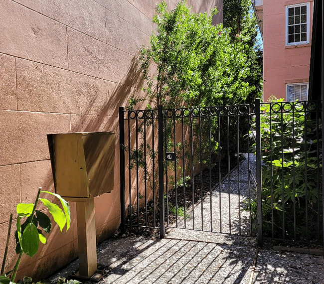 Gated secure entry and mailbox on East Jones St,