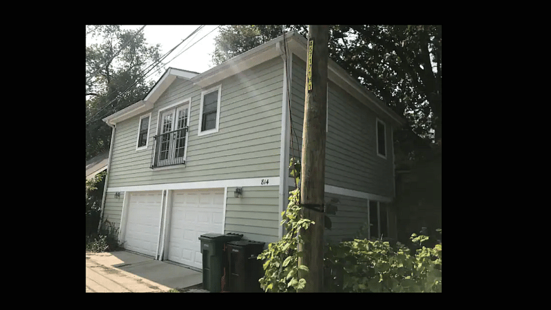 The back of  the unit. Open the door with your remote control fob, drive in, and walk of the stairs to your (the only) unit. The stairs are also pictured.